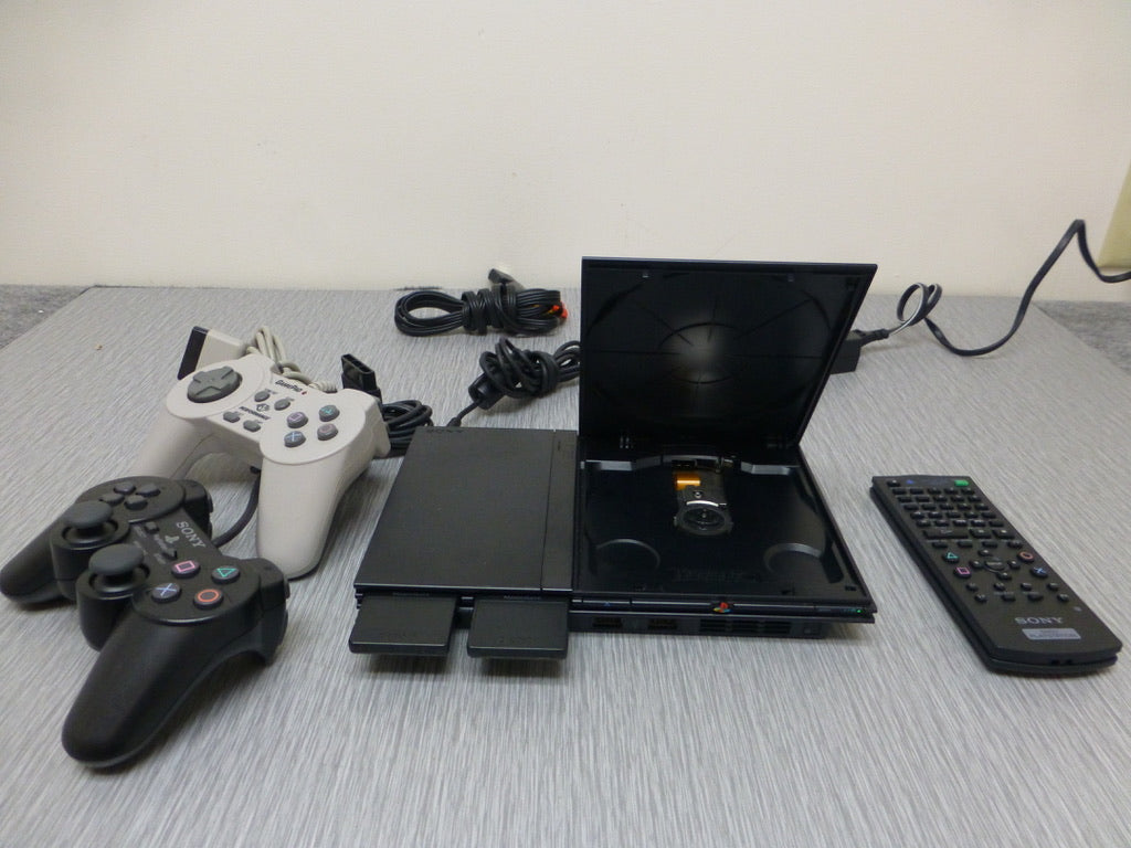 Sony Playstation 2 PS2 Slim w/ Controllers, Memory Cards and * REMOTE *